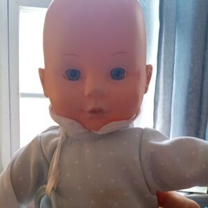 Baby Doll with Blue Eyes and White Polka Dot Outfit
